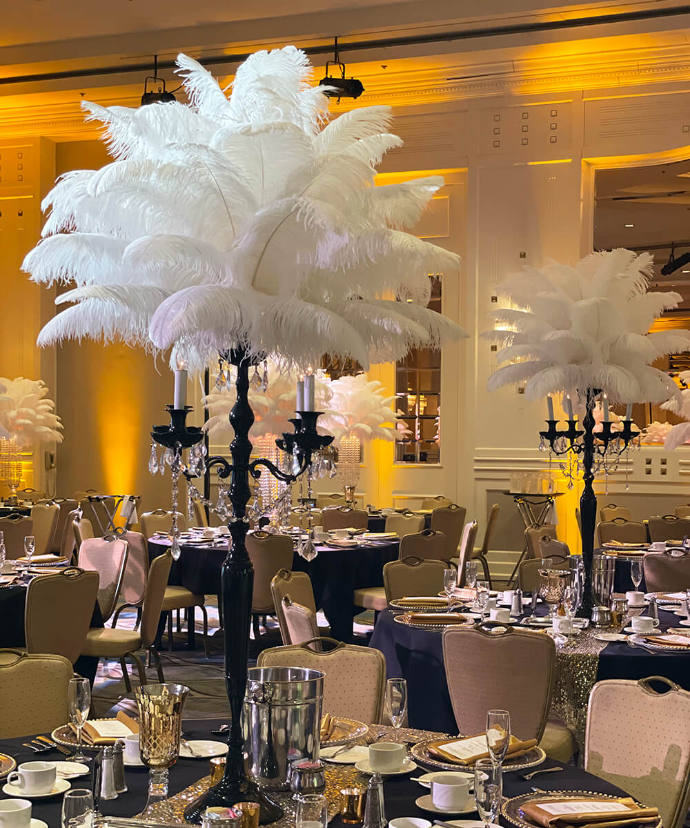 Black candelabra ostrich feathers centerpiece