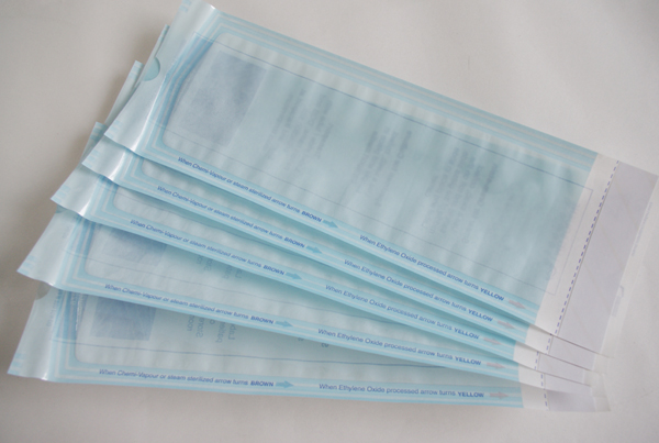 Self-sealing sterilization pouch